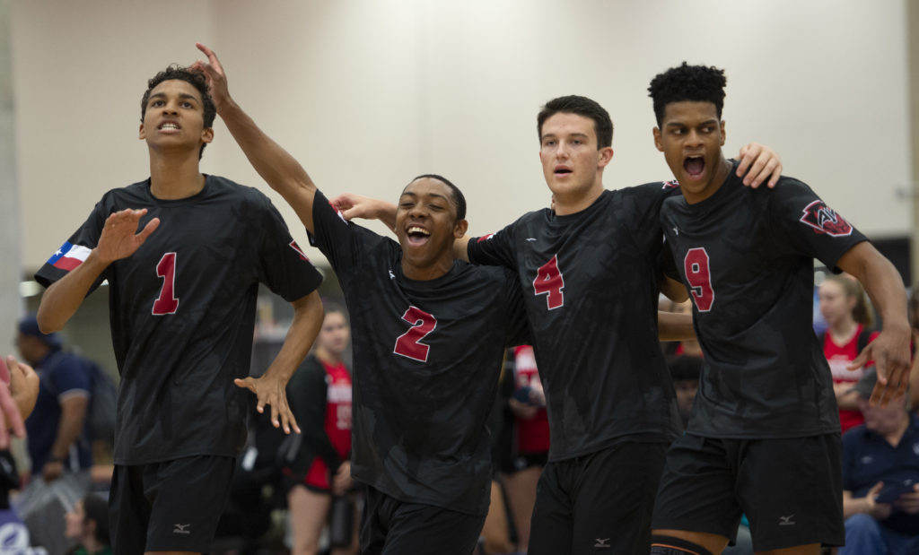 boys team celebrating